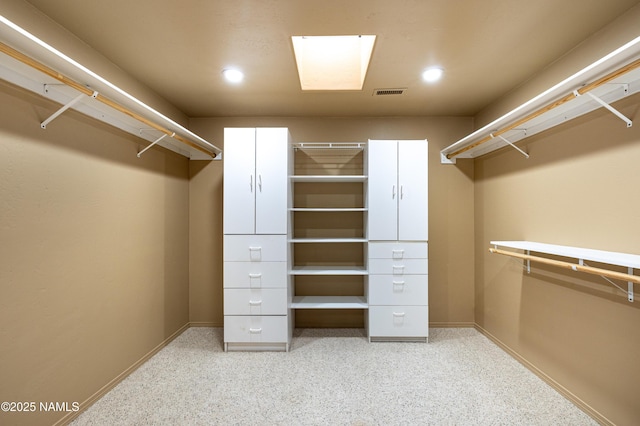 walk in closet with visible vents