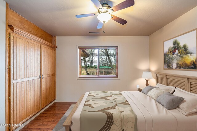 unfurnished room with carpet floors, visible vents, and ceiling fan