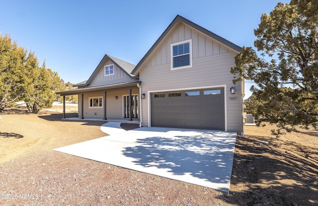 view of front facade with covered porch and a garage