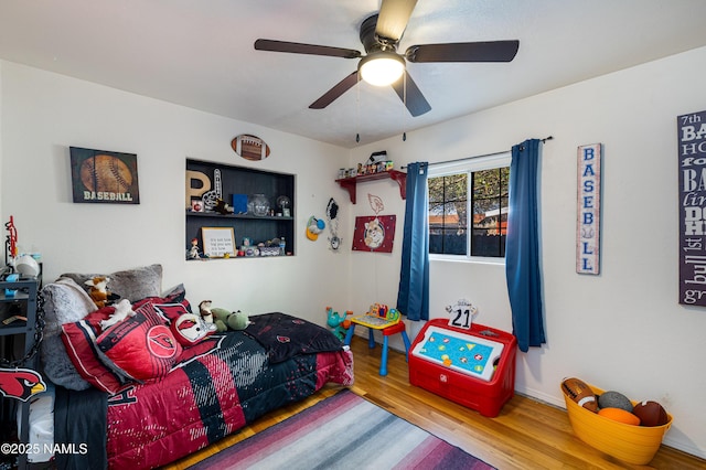 502 N Humbolt St, Williams, AZ 86046 - bedroom with wood finished floors and ceiling fan