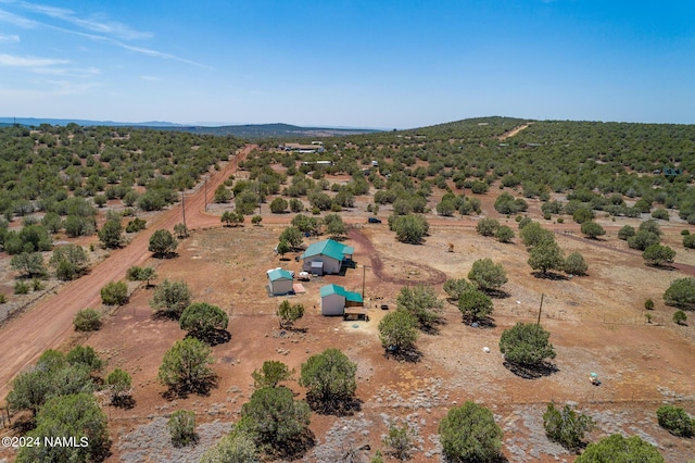 birds eye view of property featuring a rural view