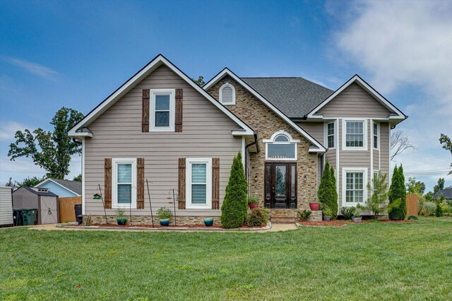 view of front of house with a front lawn