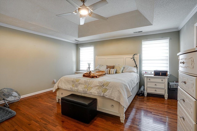 2255 Tristram Rd, Chattanooga, TN 37421 - bedroom featuring a tray ceiling, crown molding, dark wood-type flooring, and visible vents