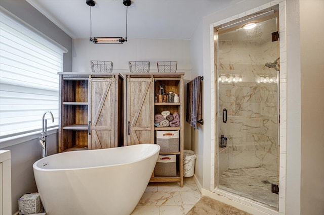 bathroom featuring separate shower and tub