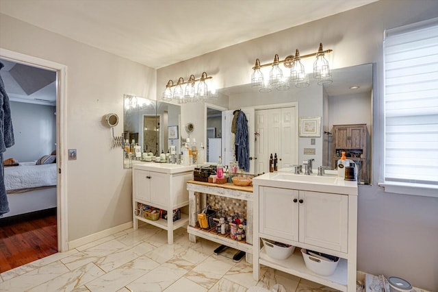 bathroom with vanity and hardwood / wood-style flooring