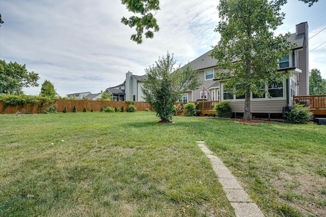 view of yard with a deck