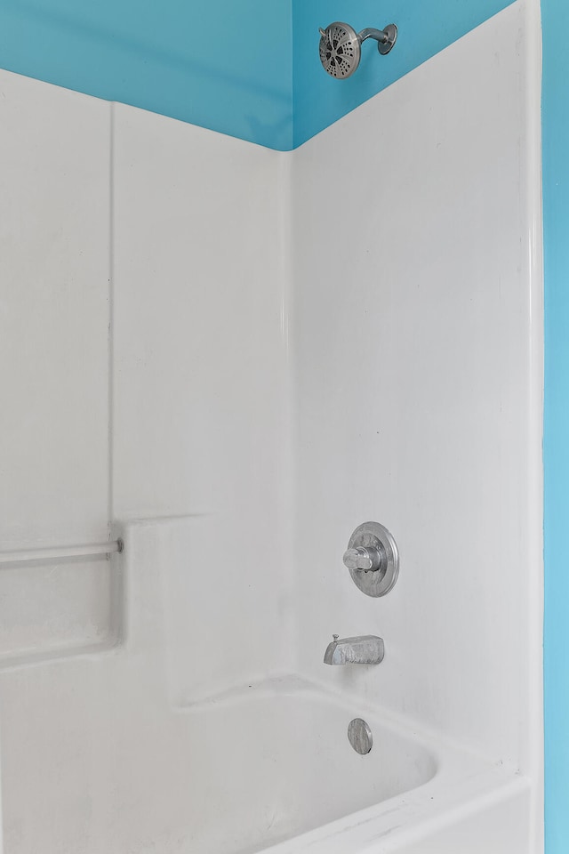 bathroom featuring washtub / shower combination