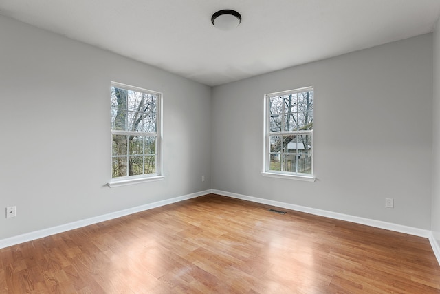 empty room featuring light hardwood / wood-style floors