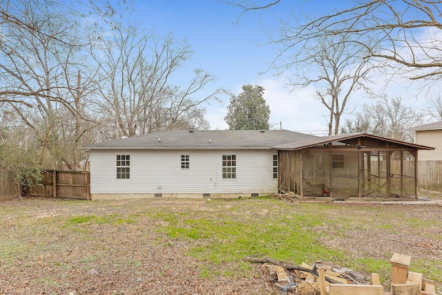 back of house with a sunroom