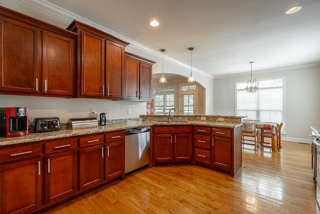 kitchen featuring a notable chandelier, dishwasher, kitchen peninsula, sink, and light hardwood / wood-style floors