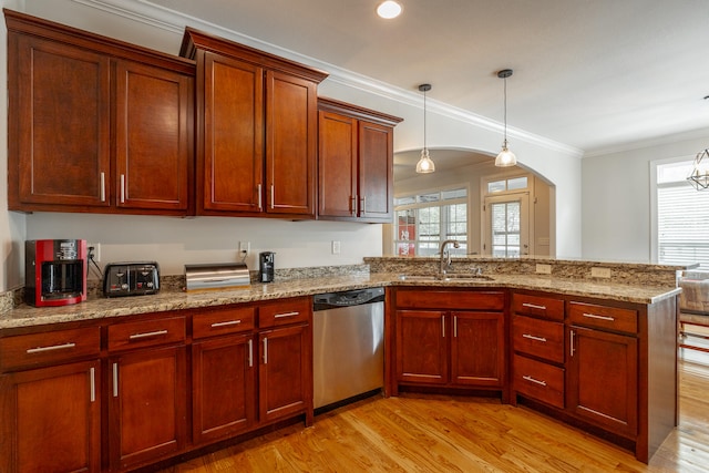 kitchen featuring decorative light fixtures, dishwasher, light hardwood / wood-style floors, sink, and ornamental molding