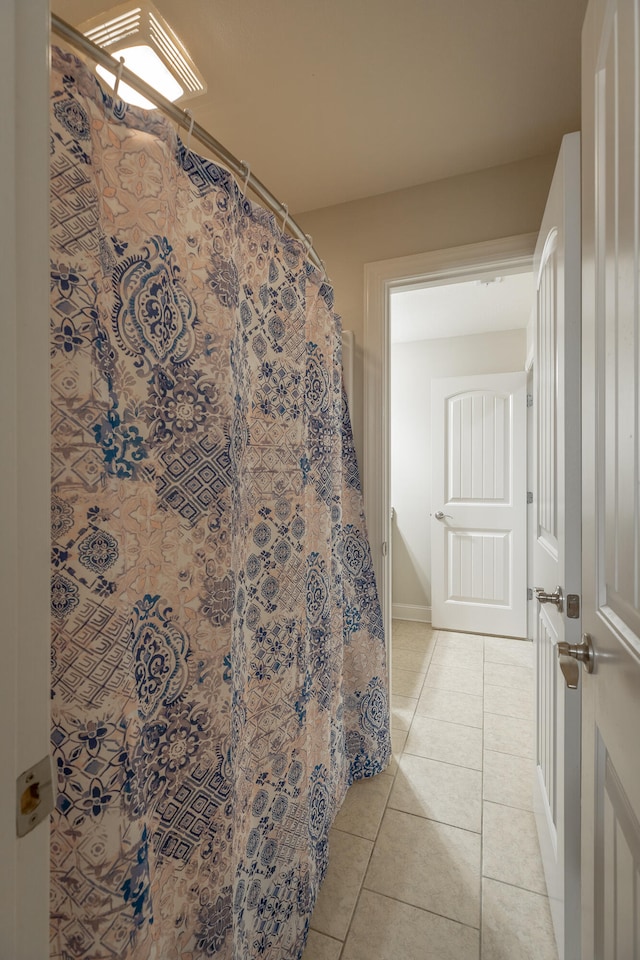 bathroom featuring tile patterned flooring