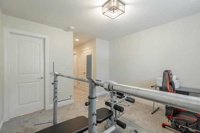 exercise room featuring carpet flooring