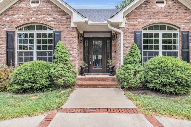 property entrance featuring french doors