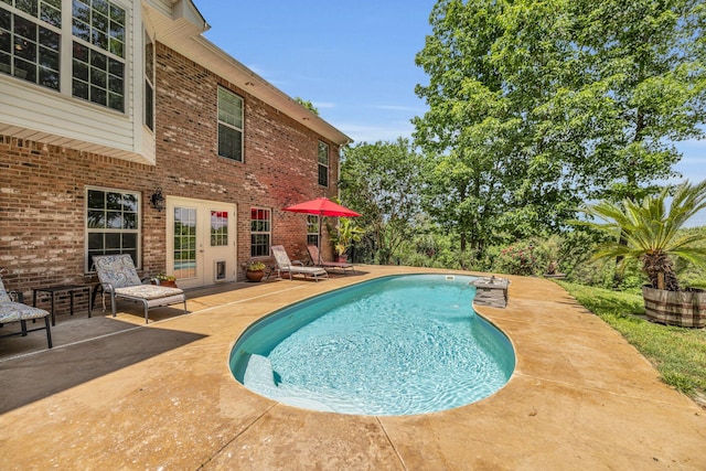 view of pool with a patio area