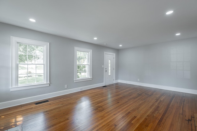 interior space with dark hardwood / wood-style flooring