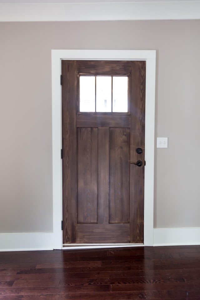 entrance foyer featuring hardwood / wood-style floors