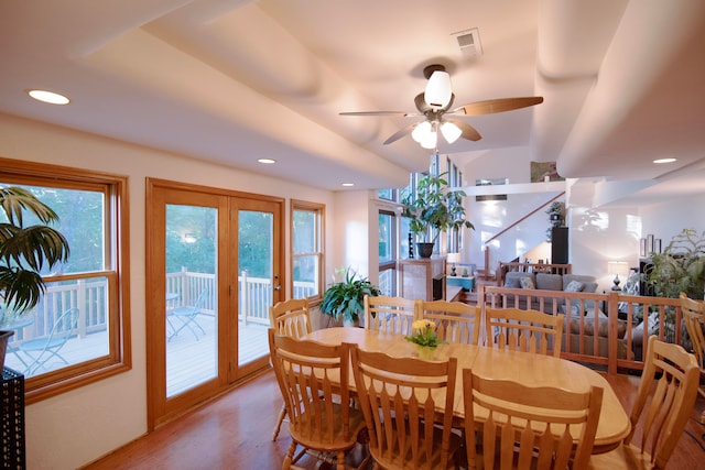 dining space featuring light hardwood / wood-style floors, french doors, and ceiling fan