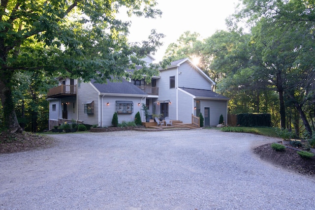 front of property with a balcony