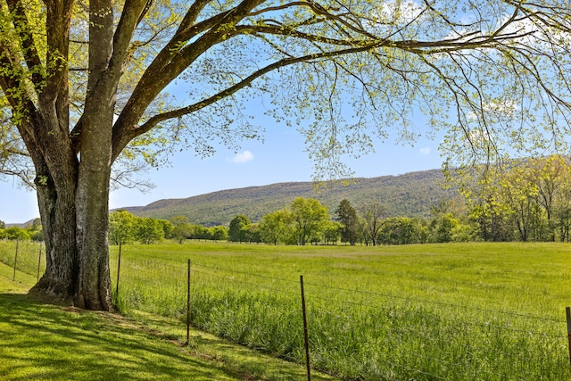 property view of mountains featuring a rural view