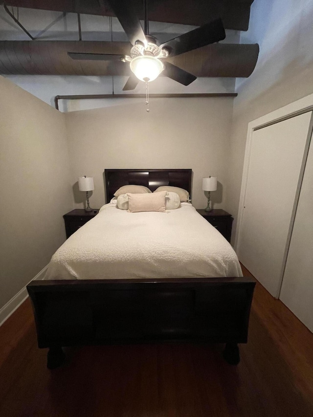 bedroom with ceiling fan and hardwood / wood-style floors