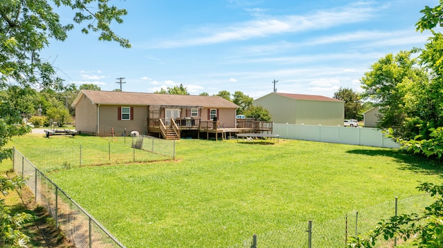 view of yard with a wooden deck