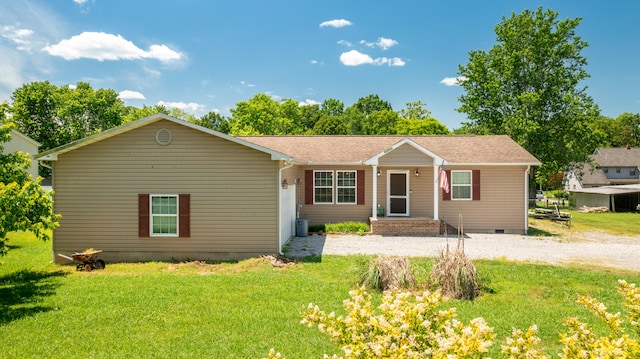 ranch-style house with a front lawn