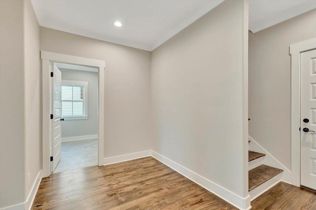 empty room with light hardwood / wood-style floors