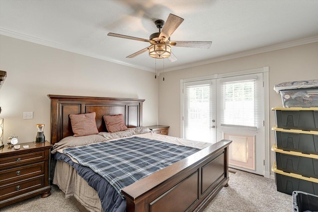 carpeted bedroom featuring crown molding, ceiling fan, and access to outside