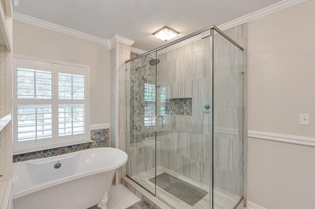 bathroom with tile patterned floors, shower with separate bathtub, and ornamental molding