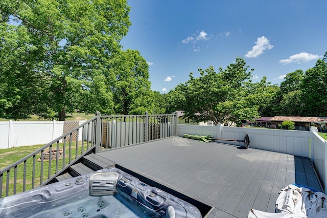 deck with a hot tub