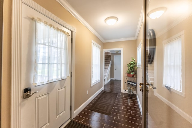 doorway featuring stairs, baseboards, wood tiled floor, and crown molding