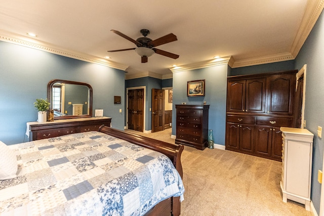 bedroom with baseboards, light carpet, ornamental molding, and a ceiling fan