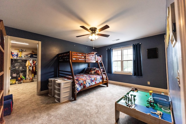 bedroom featuring visible vents, ceiling fan, baseboards, and carpet floors