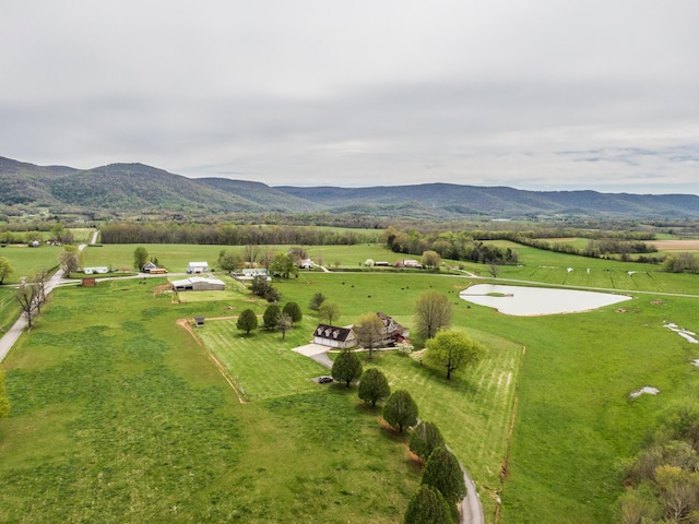 drone / aerial view with a rural view and a mountain view