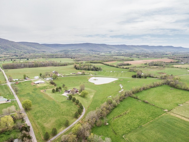 aerial view with a mountain view and a rural view