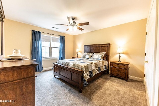 bedroom with carpet flooring, a ceiling fan, and baseboards