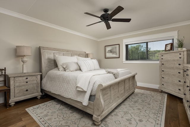 bedroom with baseboards, dark wood-style floors, ornamental molding, and a ceiling fan