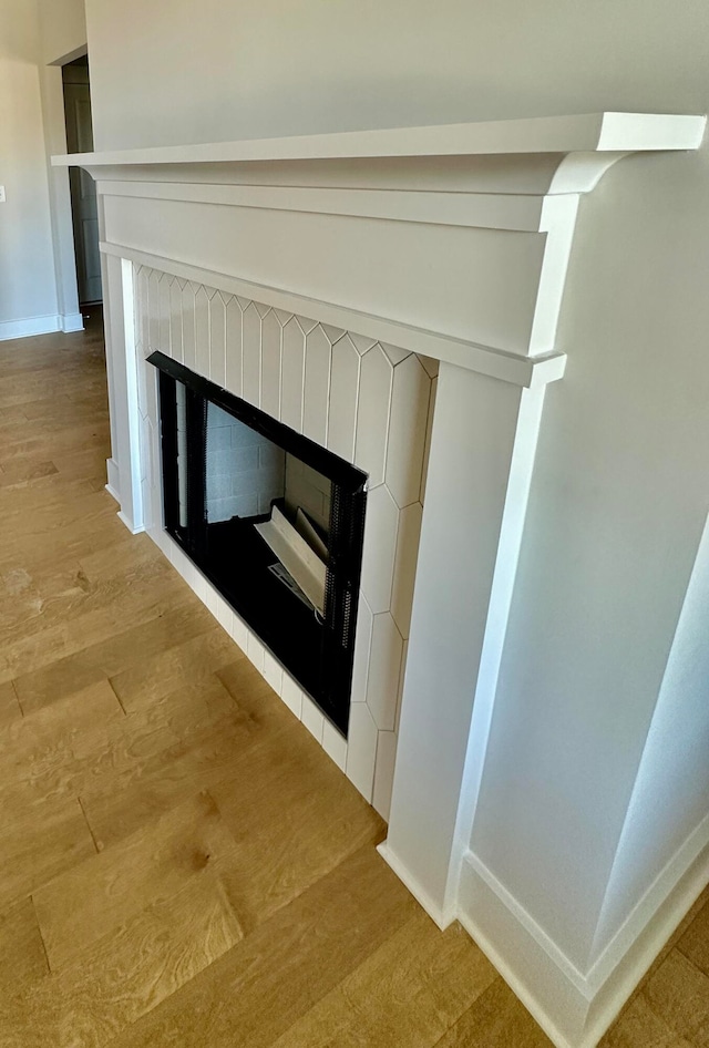 interior details featuring hardwood / wood-style floors