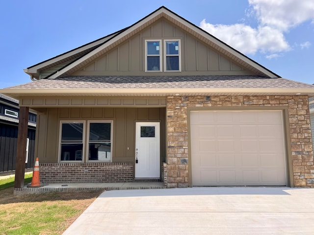 view of front of home featuring a garage and covered porch