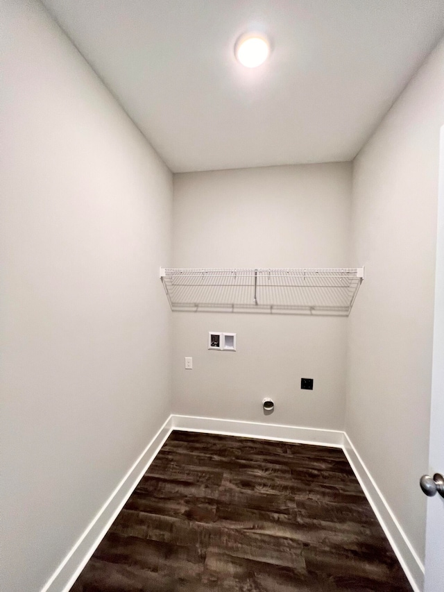 laundry room featuring hookup for a washing machine, hookup for an electric dryer, and dark hardwood / wood-style floors