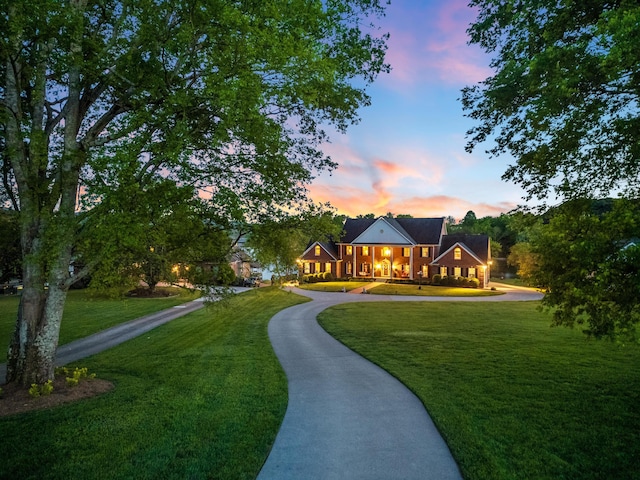 surrounding community featuring a lawn