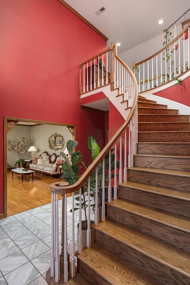 stairs featuring wood-type flooring