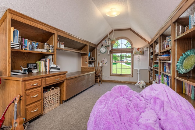 carpeted bedroom featuring lofted ceiling and a textured ceiling