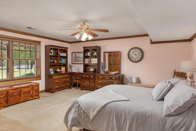 bedroom with light colored carpet, crown molding, a textured ceiling, and ceiling fan