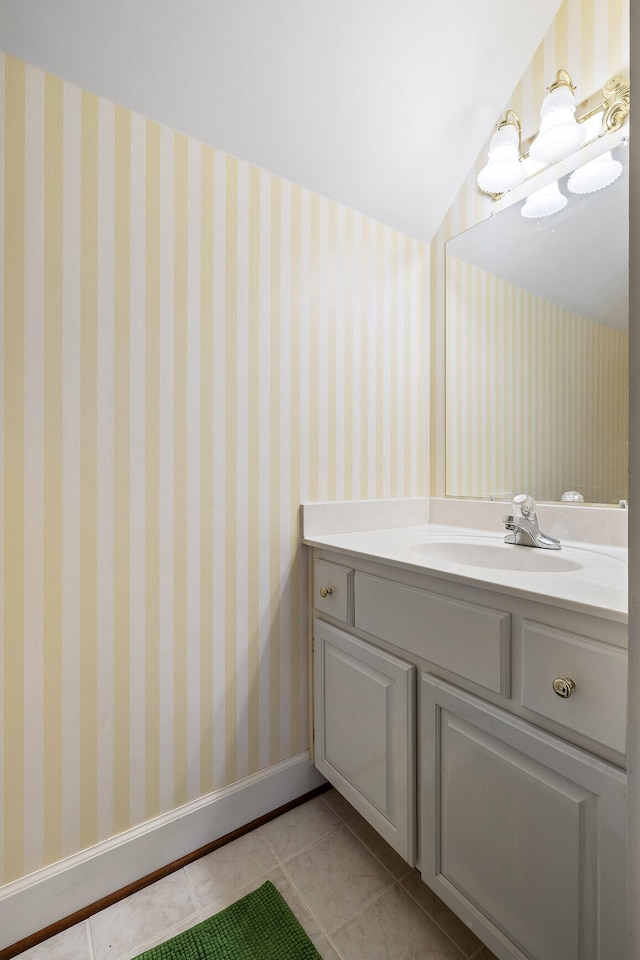 bathroom with vanity and tile patterned flooring