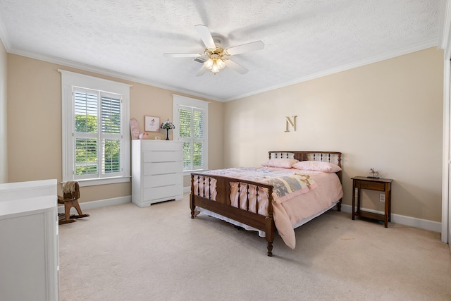 carpeted bedroom with ornamental molding, a textured ceiling, and ceiling fan