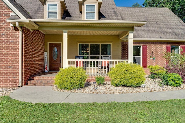 property entrance featuring a porch