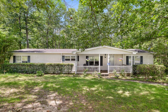 403 Lyman Daniel Rd, Trenton, GA 30752 - ranch-style home with a front lawn