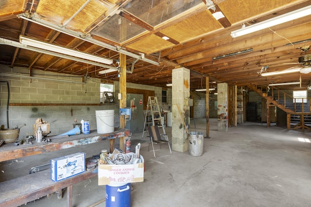 basement featuring concrete block wall